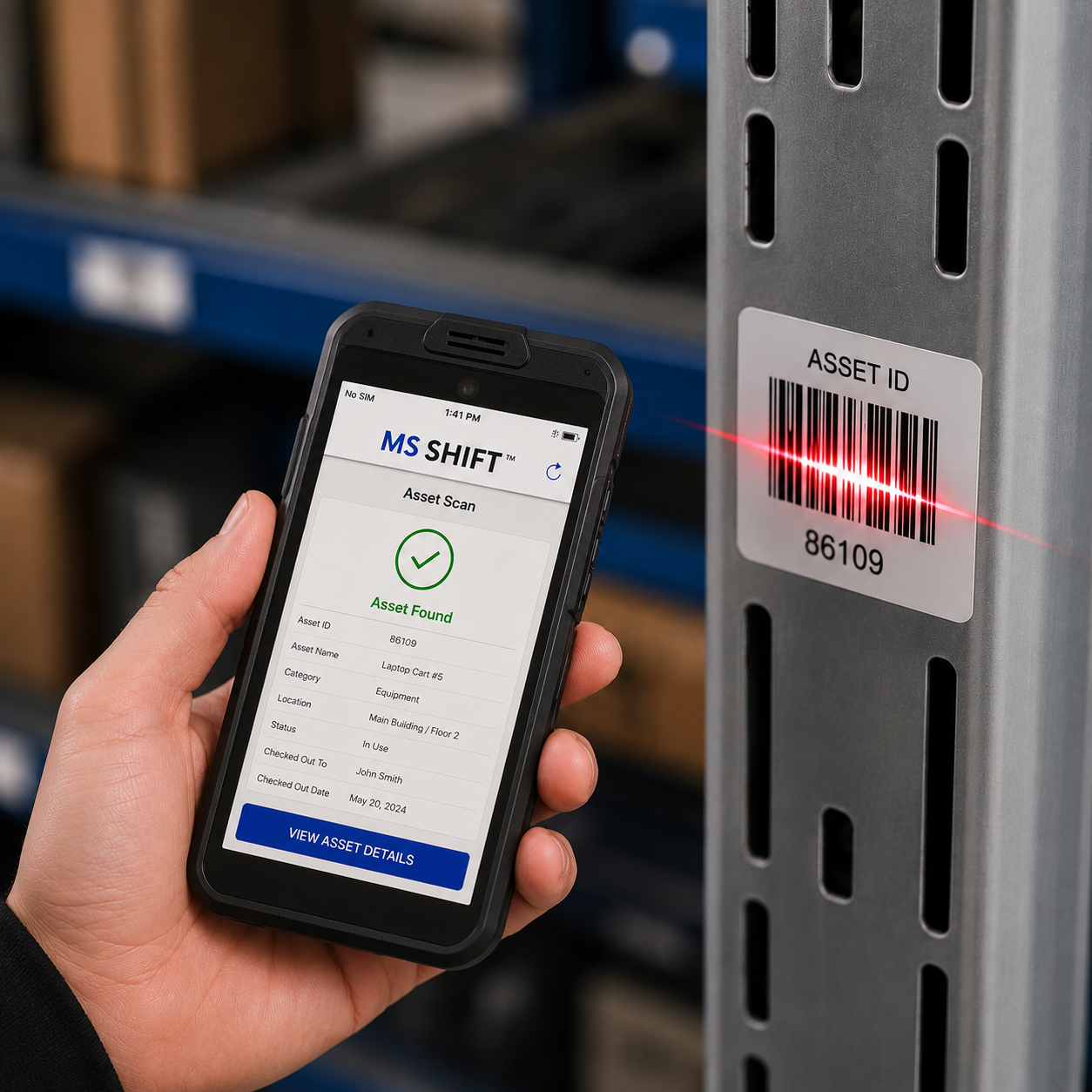 Handheld scanner confirming an asset&rsquo;s ID, location and checkout status